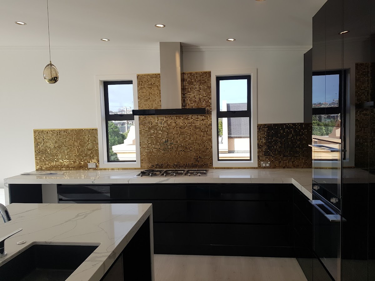 Premium gold mosaic kitchen splashback tiled by Marco Tiling Limited